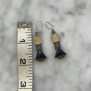 Black and ivory stone drop earrings.